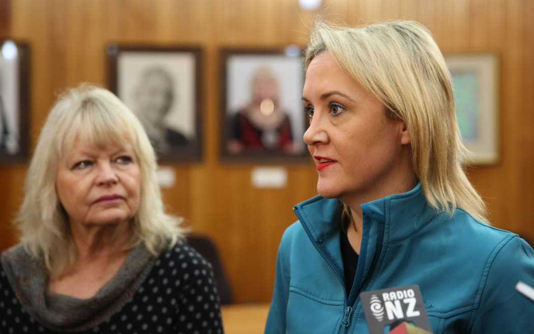 Civil Defence Minister Nikki Kaye gives an update on flooding, watched by Whanganui Mayor Annette Main.