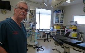 Christchurch surgeon, Philip Bagshaw, in an operating theatre at the city's charity hospital.