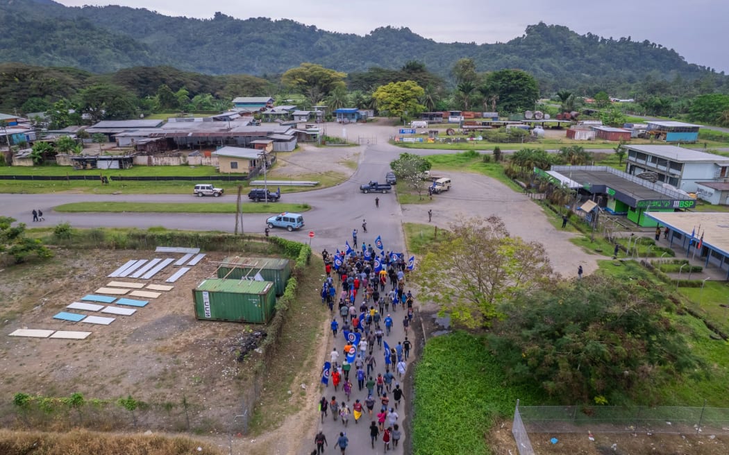 Bougainvilleans marching during the Independence day celebrations earlier this month. President Toroama says the Infrastructure Agreement is a "momentous step" for the government to "building a prosperous future for Bougainville through substantial advancements in critical infrastructure development".