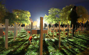Crosses laid out in Christchurch in memorial of those who died.