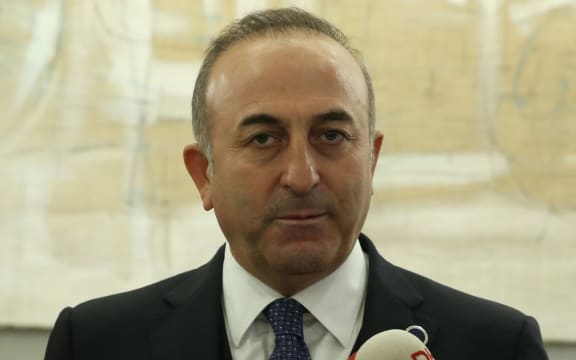 Turkey's Minister of Foreign Affairs Mevlut Cavusoglu delivers a speech at the end of the International Libya Conference in Rome, Italy on December 13, 2015. Abdulhamid Hosbas / Anadolu Agency