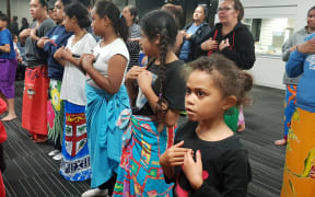 Rotuman children are learning to dance the traditional tautoga.