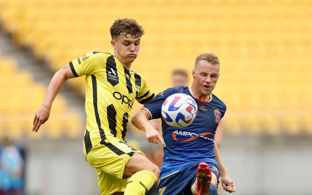 Callan Elliot of the Phoenix in action against the Newcastle Jets.