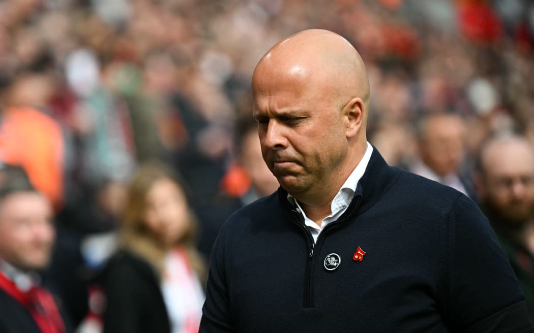 Liverpool's Dutch manager Arne Slot reacts during the English Premier League football match between Liverpool and West Ham United at Anfield in Liverpool, north west England on April 13, 2025. (Photo by Paul ELLIS / AFP) / RESTRICTED TO EDITORIAL USE. NO USE WITH UNAUTHORIZED AUDIO, VIDEO, DATA, FIXTURE LISTS, CLUB/LEAGUE LOGOS OR 'LIVE' SERVICES. ONLINE IN-MATCH USE LIMITED TO 120 IMAGES. AN ADDITIONAL 40 IMAGES MAY BE USED IN EXTRA TIME. NO VIDEO EMULATION. SOCIAL MEDIA IN-MATCH USE LIMITED TO 120 IMAGES. AN ADDITIONAL 40 IMAGES MAY BE USED IN EXTRA TIME. NO USE IN BETTING PUBLICATIONS, GAMES OR SINGLE CLUB/LEAGUE/PLAYER PUBLICATIONS. /
