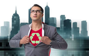 Businessman in superhero concept with red cover