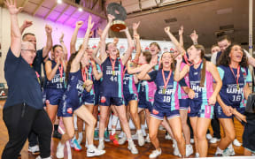 Tauranga Whai players celebrate their Tauihi Basketball Aotearoa final win over the Tokomanawa Queens in Tauranga, 22 Dec 2024.