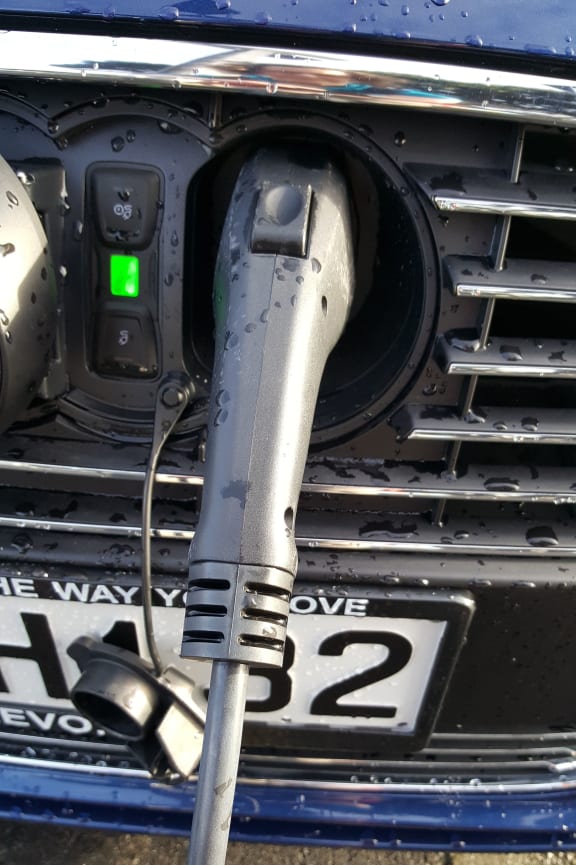 Charging an electric vehicle.