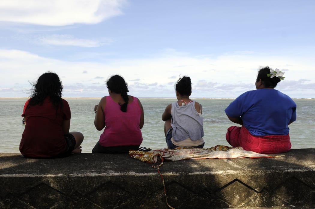 Samoan women gather on the waterfront in Apia.