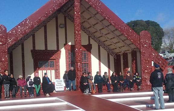 Iwi members gather at Tama te Kapua at Ohinemutu after marching to the Rotorua hospital.