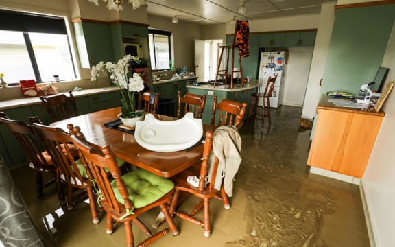 thick mud on the floor of a kitchen