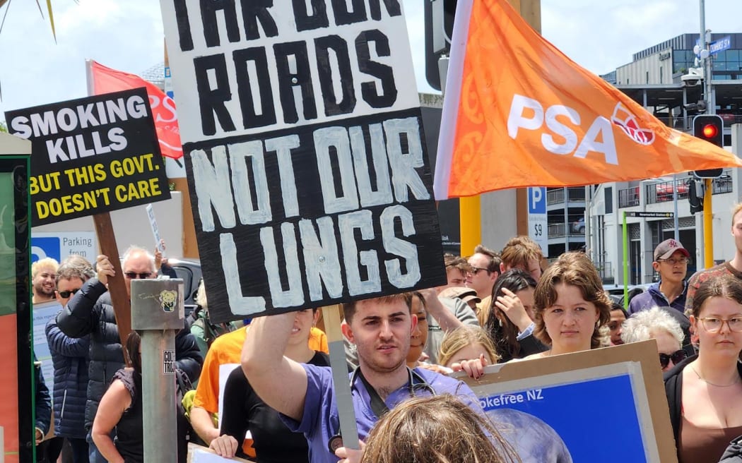 Protesters outside David Seymour's electorate office in Auckland.