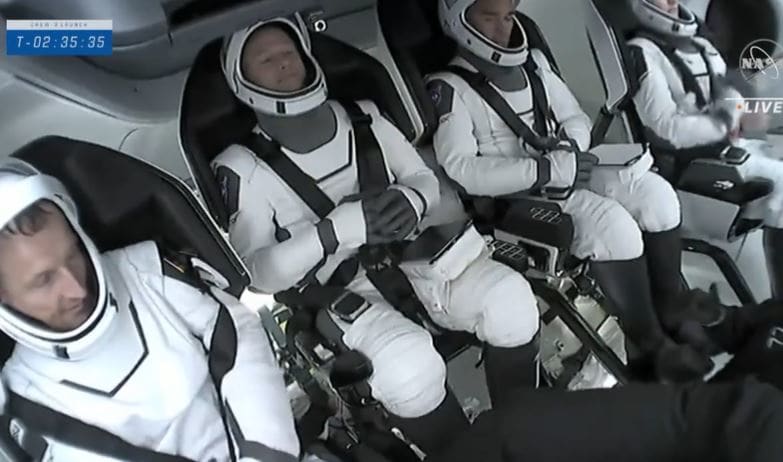 Nasa and private rocket company SpaceX launched four astronauts into orbit