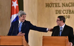 US Secretary of State John Kerry (L) and Cuban Foreign Minister Bruno Rodriguez deliver a joint press conference.