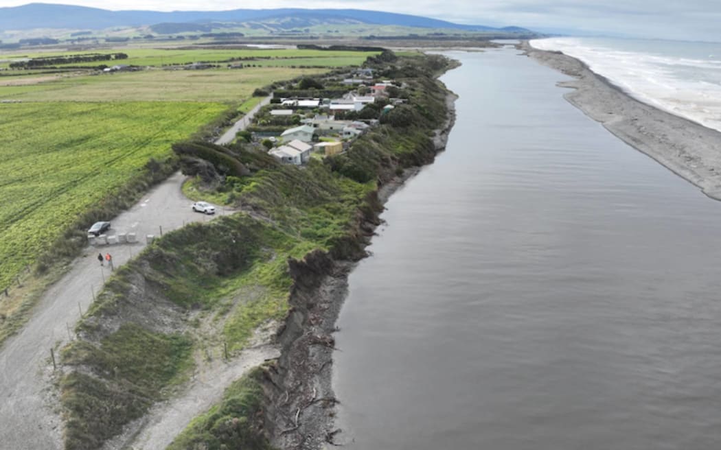 An aerial view of Bluecliffs, perched next to the Waiau River and ocean.
