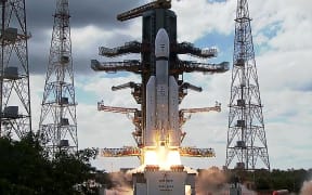 This screen grab made from video footage from ISRO via AFPTV taken on July 14, 2023 shows an Indian Space Research Organisation rocket carrying the Chandrayaan-3 spacecraft lifting off from the Satish Dhawan Space Centre in Sriharikota.