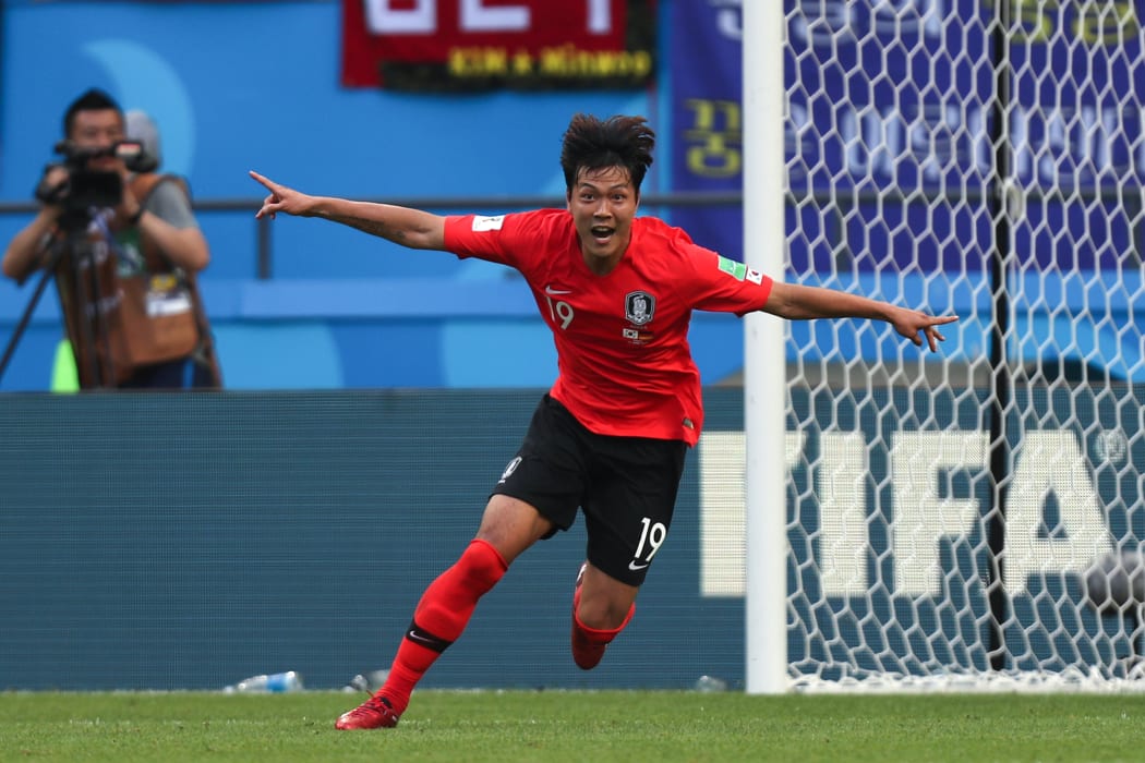 South Korea's defender Kim Young-gwon celebrates his goal during his team's winning Group F match against Germany.