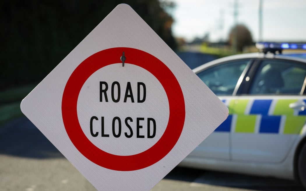 The scene of a crash where four people died after a truck and van collided near Ashburton.