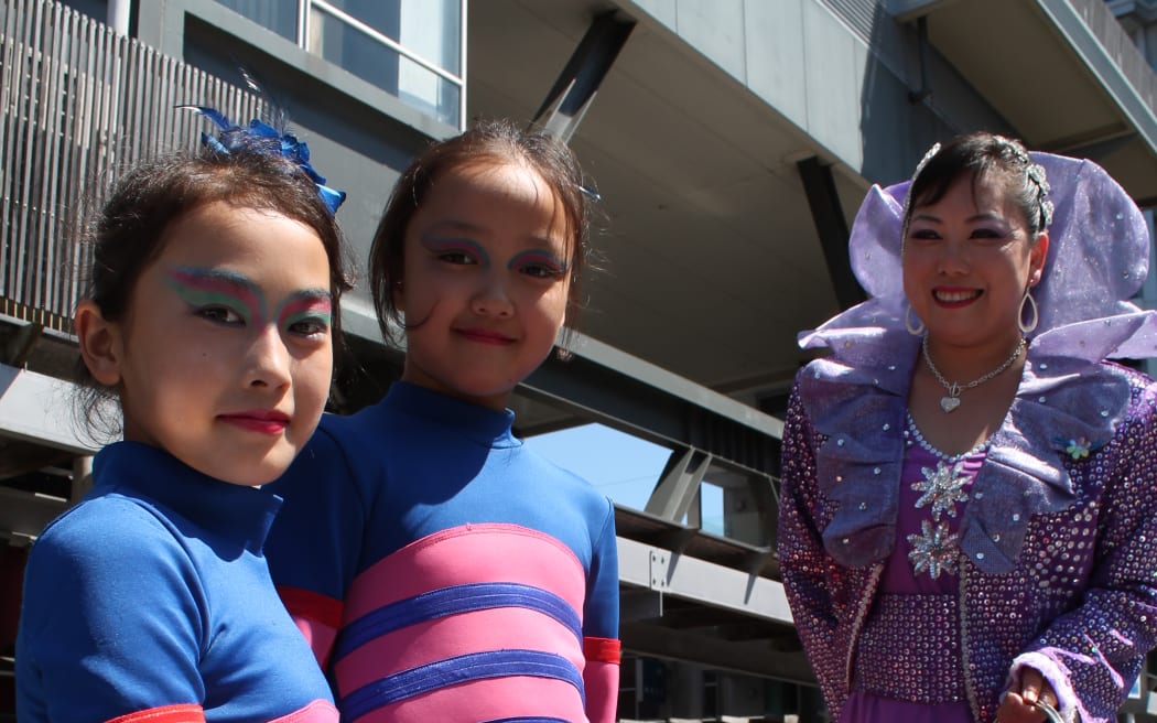 Total dedication (Co-founder Judi Hou and two young acrobats)
