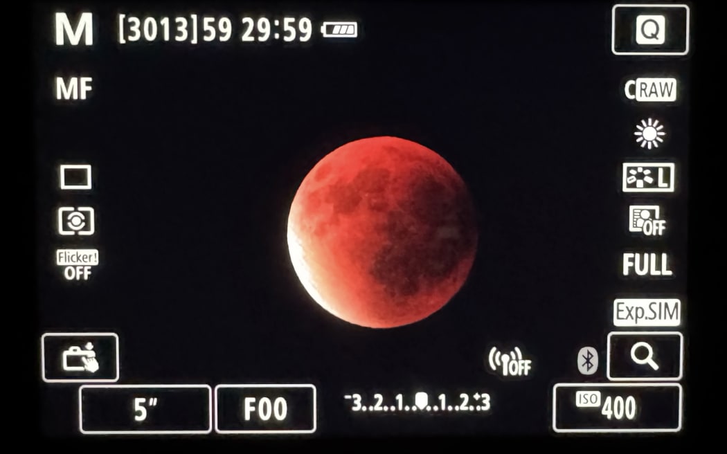 A total eclipse of the moon, as seen from Middlemarch, Otago.