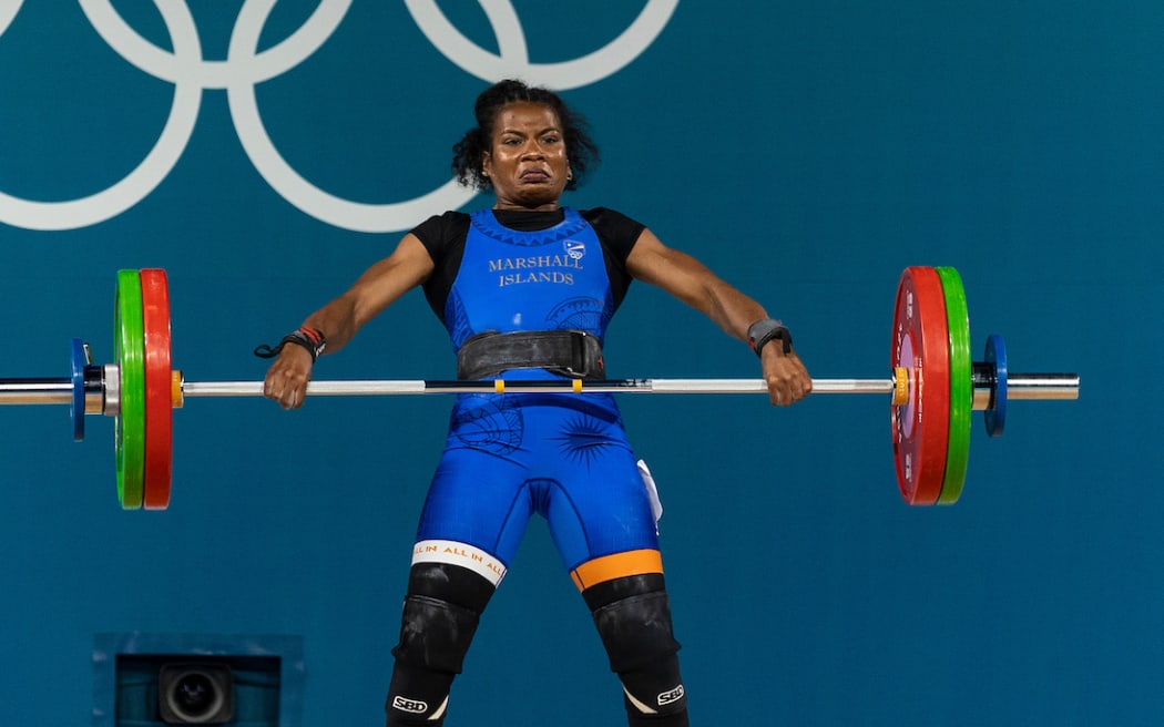 Mathlynn Sasser of the Marshall Islands finished 10th in the women's 59kg weightlifting.