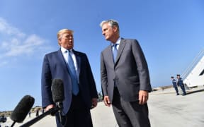 US President Donald Trump speaks next to new national security adviser Robert O'Brien.