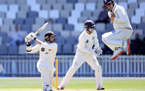 Devon Conway slashes through point against Auckland.