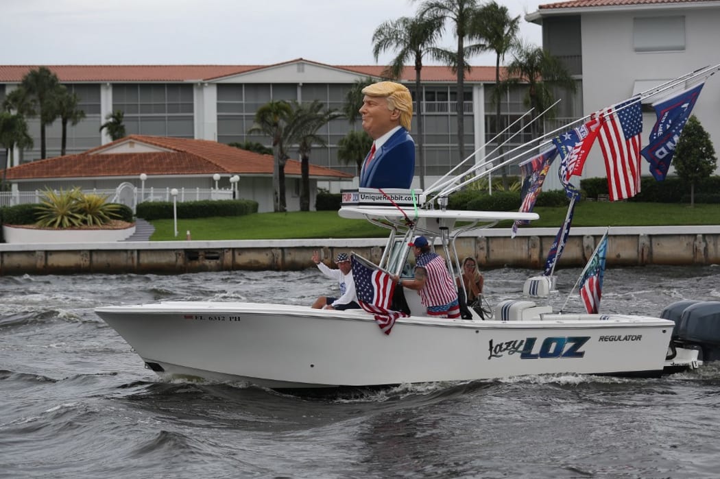 FORT LAUDERDALE, FLORIDA - OCTOBER 03: Boaters show their support for President Donald Trump during a parade down the Intracoastal Waterway on October 3, 2020 in Fort Lauderdale, Florida.