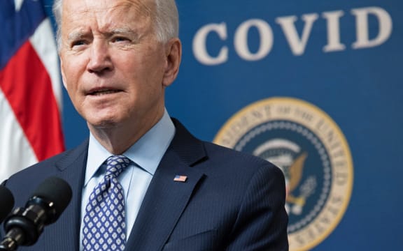US President Joe Biden speaks about the 50 million doses of the Covid-19 vaccine shot administered in the US during an event commemorating the milestone in the Eisenhower Executive Office Building in Washington DC, February 25, 2021.