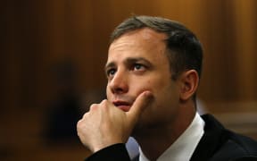 This file photo taken on October 16, 2014 shows South African paralympic athlete Oscar Pistorius waiting before his sentencing hearing at the North Gauteng High Court in Pretoria.