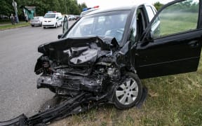 Auto accident. Crashed car in the street. Damaged car after collision