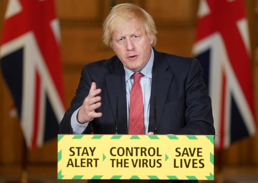 A handout image released by 10 Downing Street, shows Britain's Prime Minister Boris Johnson attending a remote press conference to update the nation on the COVID-19 pandemic.