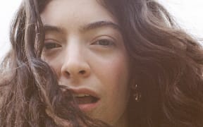 Lorde poses in yellow for her Solar Power album.