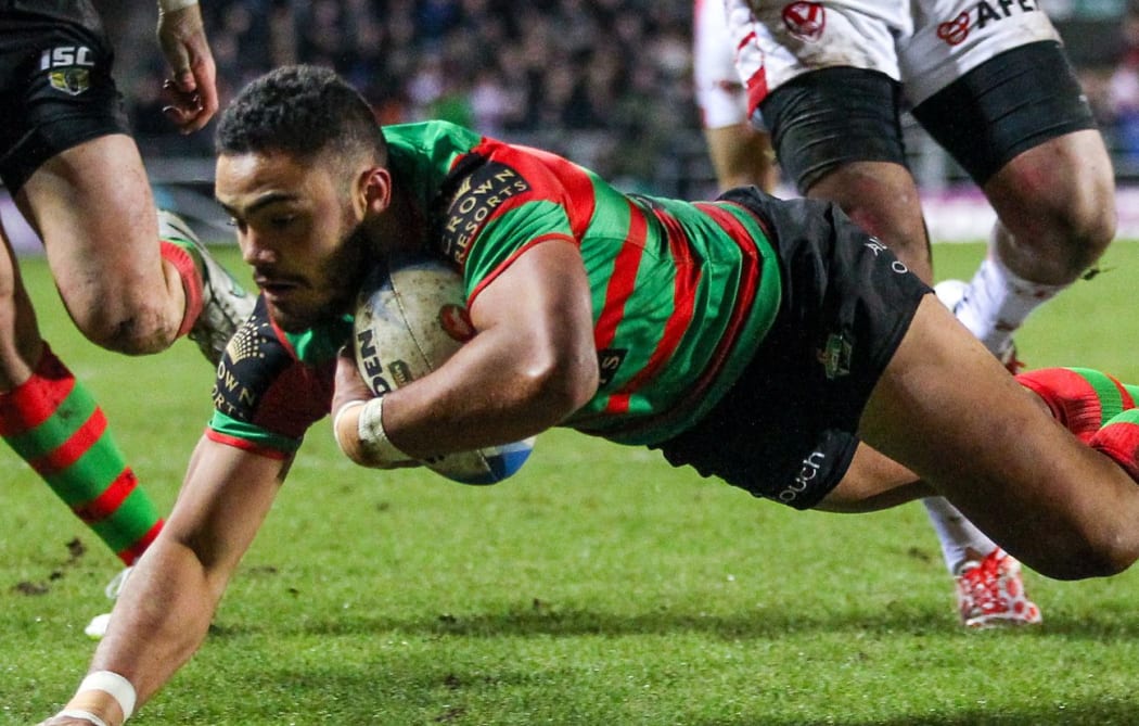 The Rabbitohs' Dylan Walker scores a try.