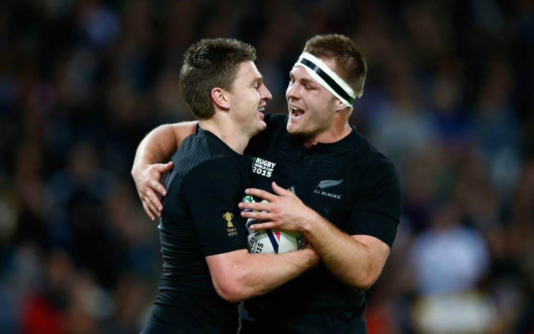 Beauden Barrett celebrates with Sam Cane after scoring his team's fourth try during the 2015 Rugby World Cup match between New Zealand and Namibia at the Olympic Stadium.