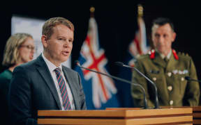 Covid-19 Response Minister Chris Hipkins and MIQ head Brigadier Jim Bliss (right).
