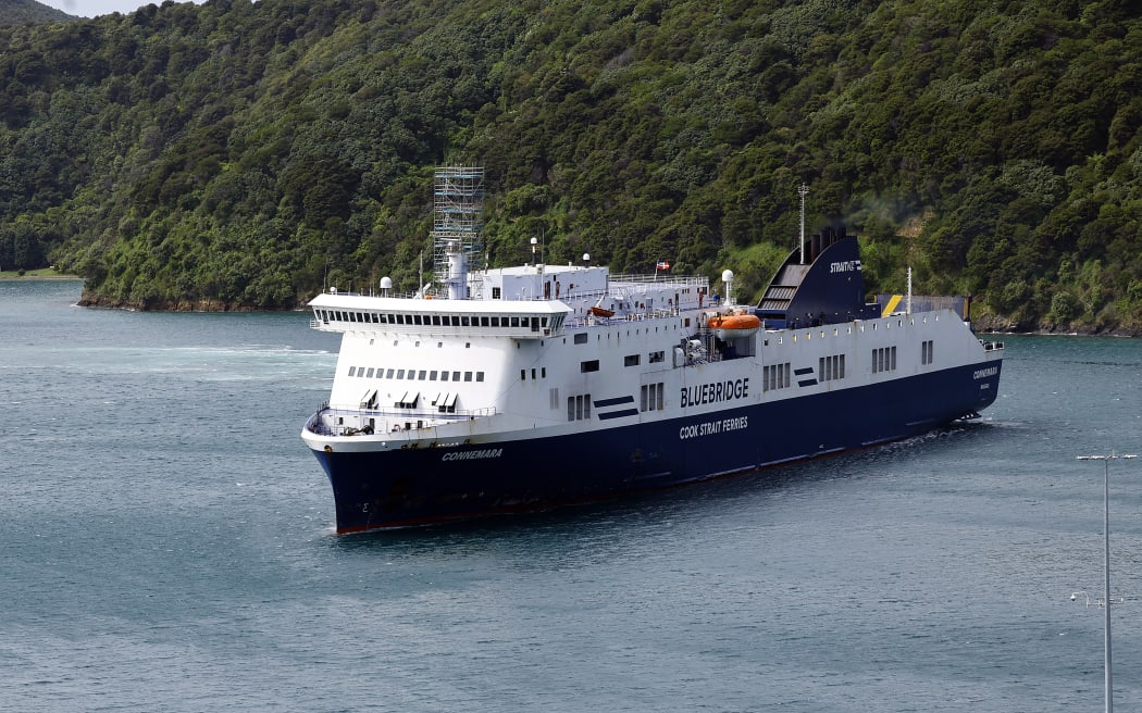Bluebridge ferry the Connemara berthing at Picton wharf, helped by a tug, after earlier hitting the wharf while attempting to berth.