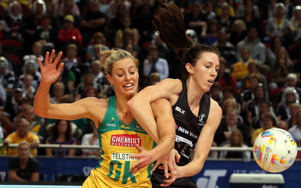 The Silver Ferns Bailey Mes takes the ball from Laura Geitz 2015.