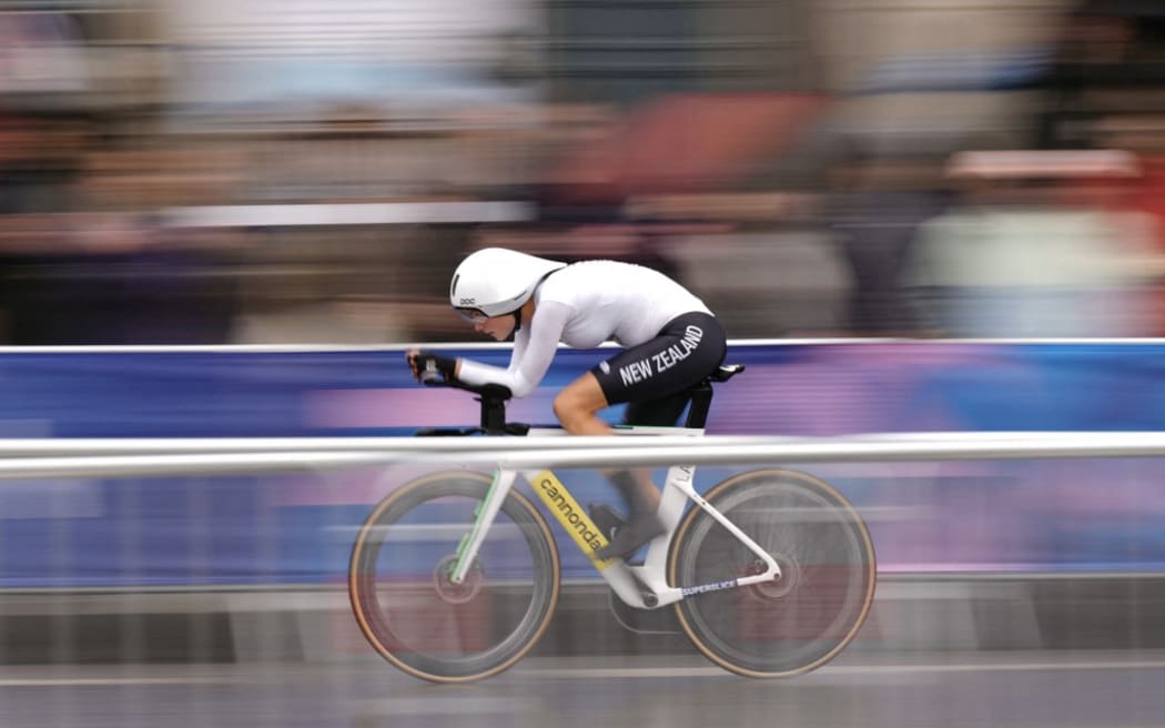 New Zealand's Kim Cadzow cycles as she competes in the women's road cycling individual time trial during the Paris 2024 Olympic Games in Paris, on July 27, 2024. (Photo by Dimitar DILKOFF / AFP)