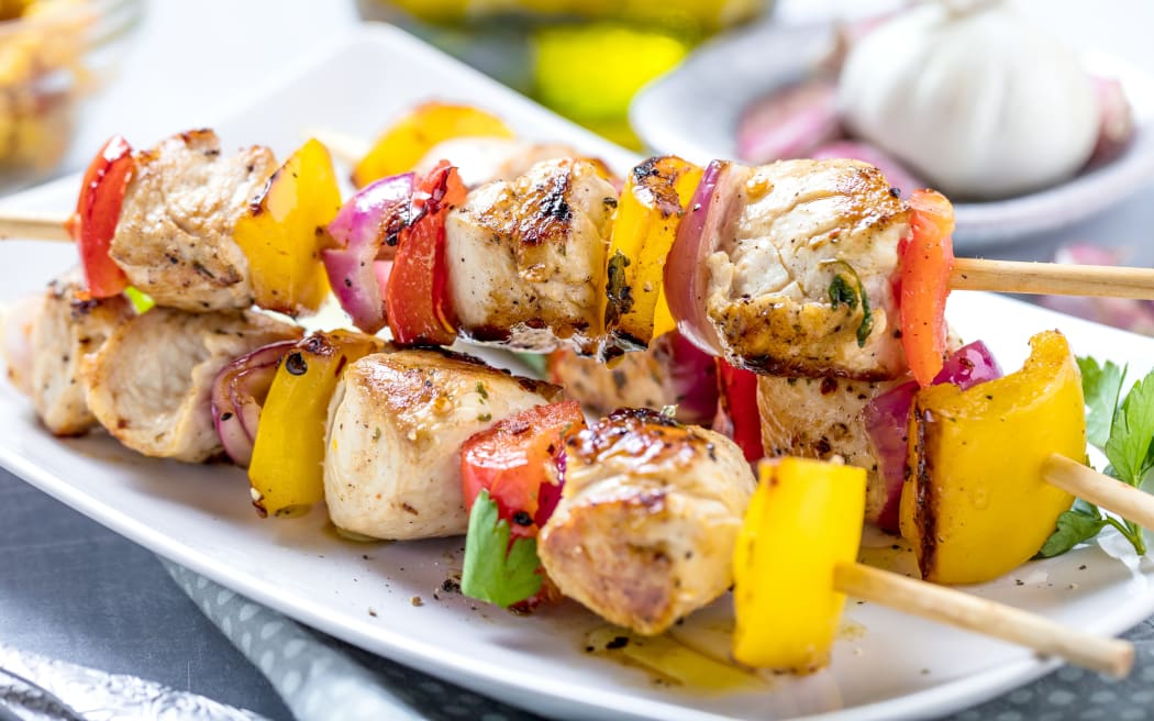 Grilled skewers of vegetables and meat on the Table