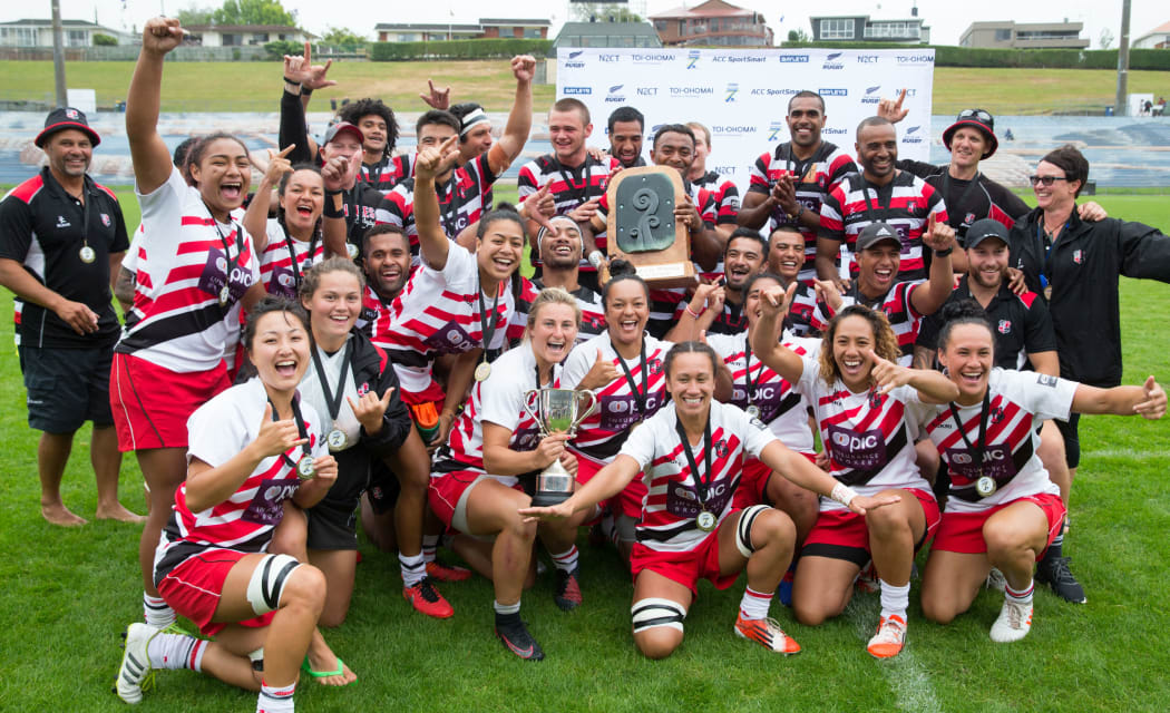 Jubilant Counties Manukau players with their trophies.