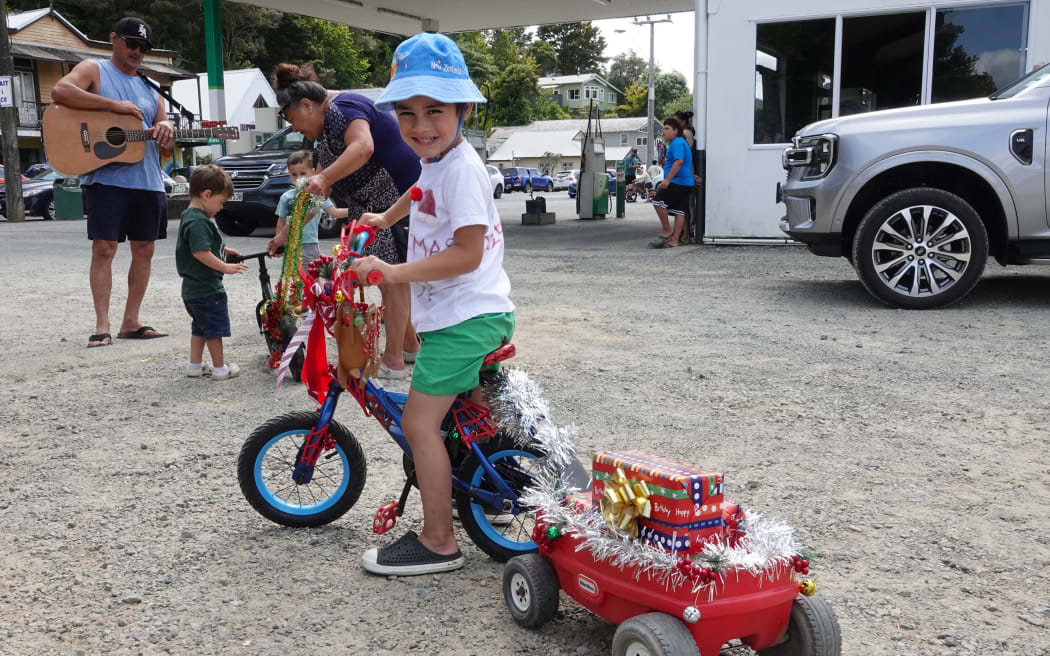 Four-year-old Kairehu Schomberg is ready for the parade.