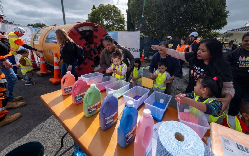 Preschoolers painted their hands in bright colours before pressing them onto Moana, celebrating the start of the $64 million Māngere East wastewater upgrade designed to protect local waterways and support new housing.