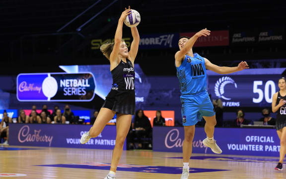 Silver Ferns Kate Heffernan (left) with Aotearoa Men Eriata Vercoe during the Cadbury Netball Series Silver Ferns v NZ Men game one at TSB Arena in Wellington on 10 October 2021.