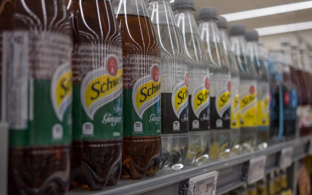Softdrink bottles on supermarket shelves