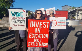Striking secondary school teachers picketing outside Selwyn College in Auckland on Wednesday, 29 March.