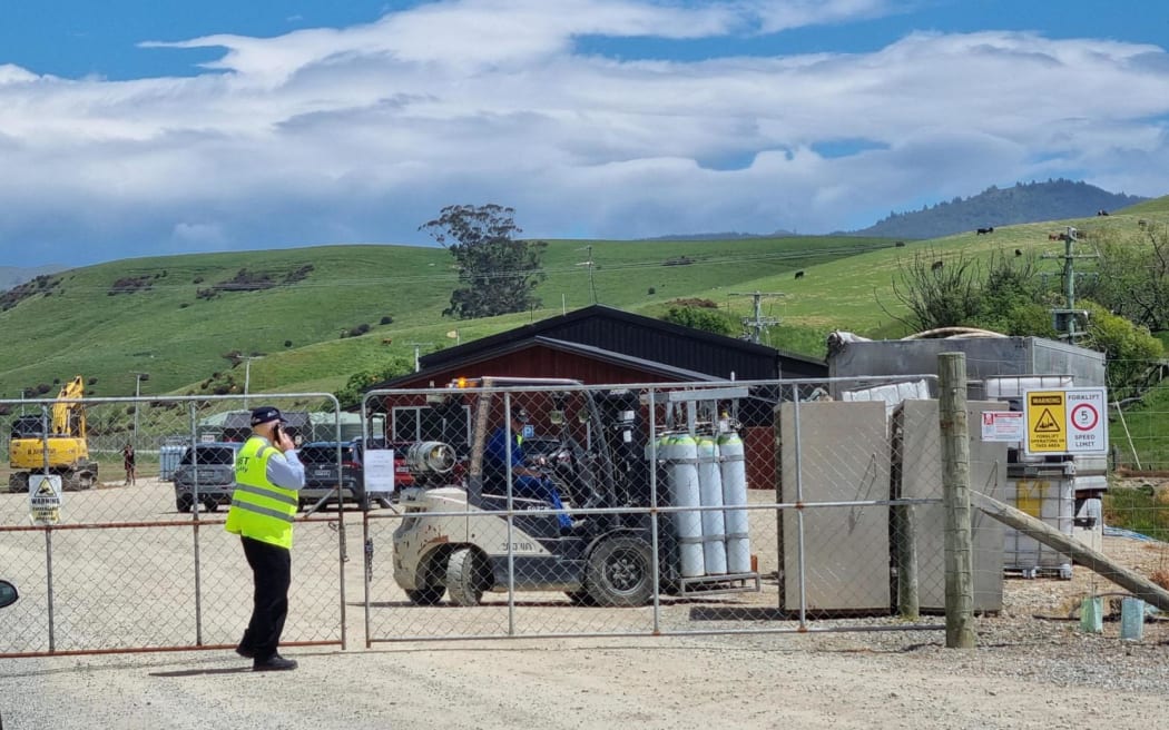 Gas bottles are being moved from the entrance to further onto Hillgrove Egg Farm on 3 December 2024.
