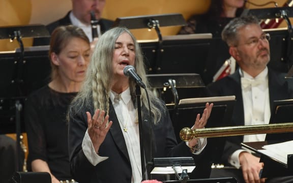US singer Patti Smith performs "A Hard Rain's A-Gonna Fall" by absent literature prize winner Bob Dylan, at the ceremony in Stockholm.