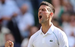 Novak Djokovic of Serbia celebrates after beating Cameron Norrie of Great Britain during the semifinals of the gentlemen's singles in the Championships, Wimbledon at All England Lawn Tennis and Croquet Club in London, the United Kingdom on July 8, 2022. Djokovic won the game 2-6,6-3,6-2,6-4 to reach the finals for the fourth consecutive tournament. ( The Yomiuri Shimbun ) (Photo by Takuya Matsumoto / Yomiuri / The Yomiuri Shimbun via AFP)