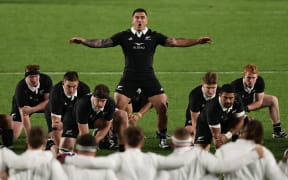 Codie Taylor leads an All Blacks haka against England.
