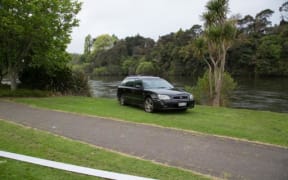 Police want informaton on a black Subaru station wagon seen parked on the banks of the Waikato River on the afternoon of 19 October 2016.